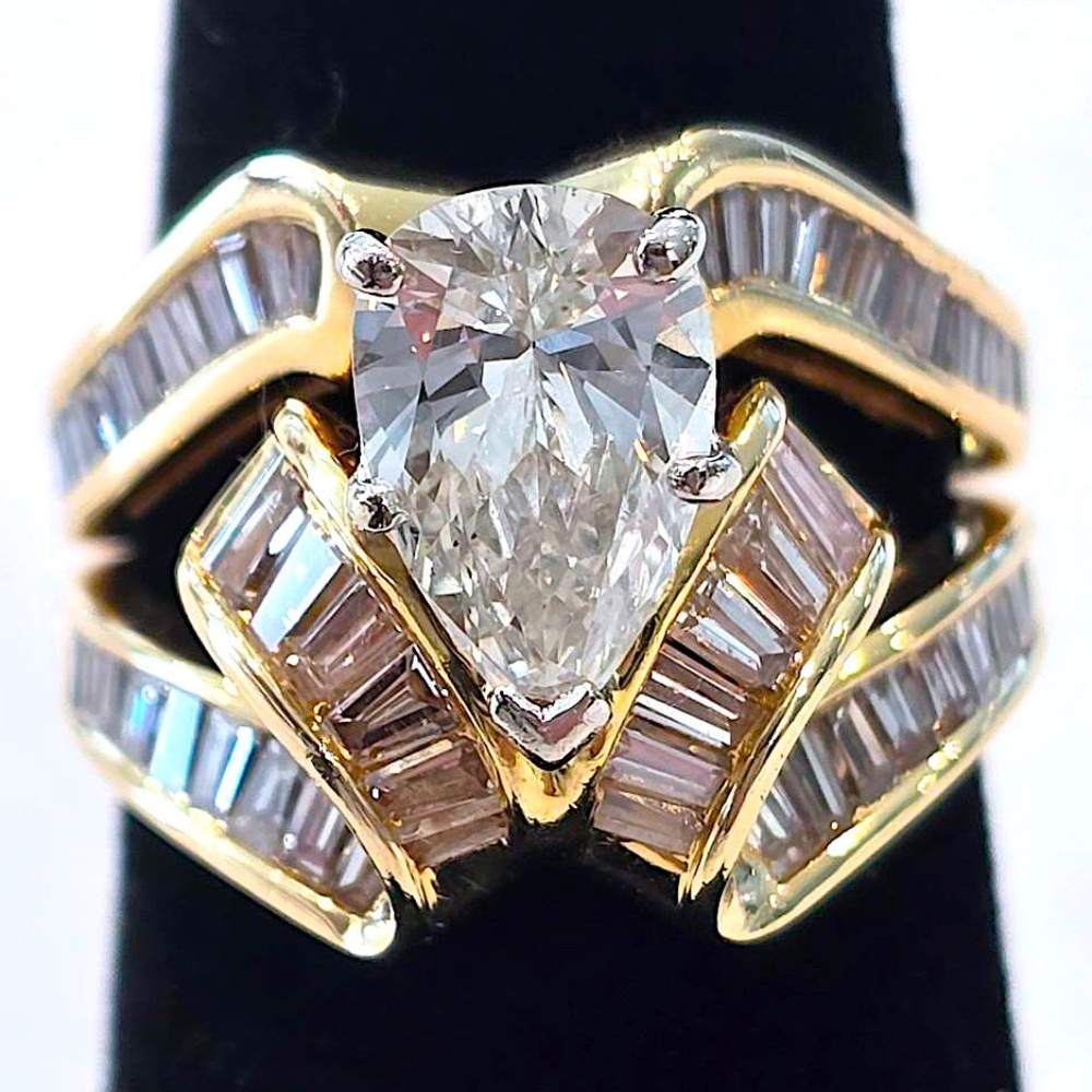 Spectacular Custom 3 ct. total, (1) Pear 1.5ct.+ (50) Baguettes 1.5ct.VVS2 (F)